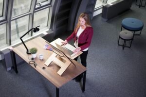 A Woman Busy Working on Her Laptop